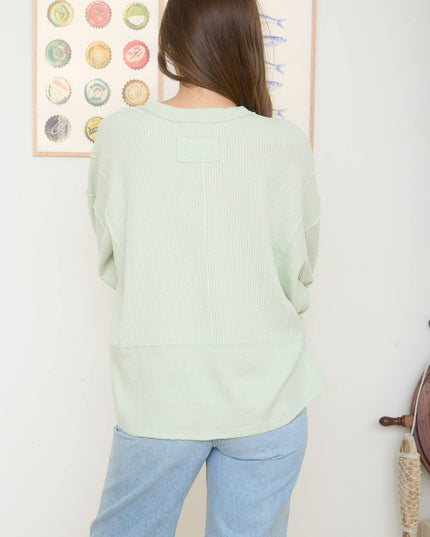 SPLIT NECK RAW EDGE LONG SLEEVE RIBBED KNIT TOP