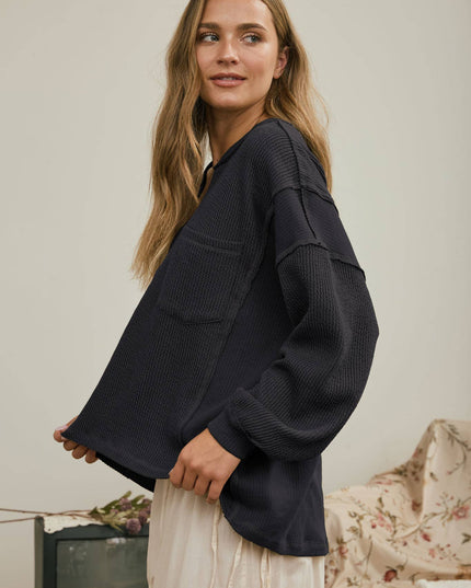 SPLIT NECK RAW EDGE LONG SLEEVE RIBBED KNIT TOP
