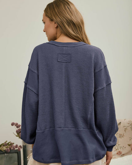 SPLIT NECK RAW EDGE LONG SLEEVE RIBBED KNIT TOP