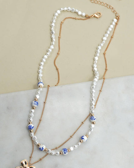 CERAMIC PORCELAIN PEARL BOW LAYER NECKLACE | 80N91555