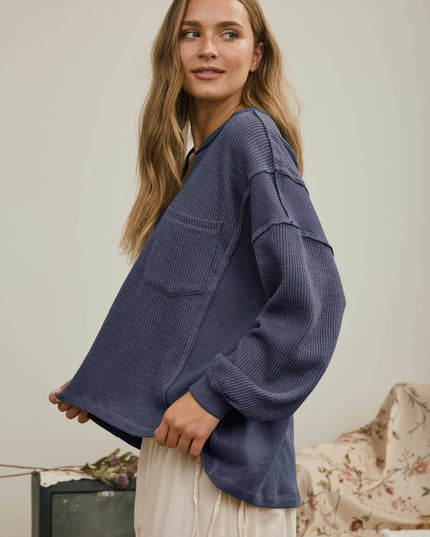 SPLIT NECK RAW EDGE LONG SLEEVE RIBBED KNIT TOP