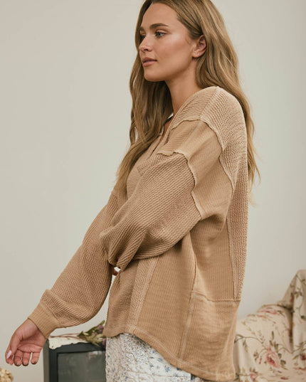 SPLIT NECK RAW EDGE LONG SLEEVE RIBBED KNIT TOP