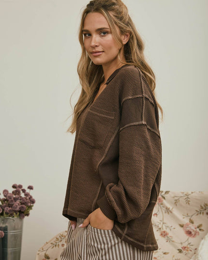 SPLIT NECK RAW EDGE LONG SLEEVE RIBBED KNIT TOP