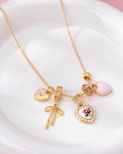 Multi Charm Porcelain Bow Ball Chain Necklace | 80N92892