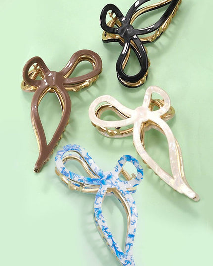 JUMBO CELLULOSE CASTING BOW HAIR CLAW CLIPS | 40H759