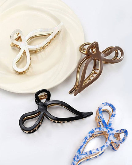 JUMBO CELLULOSE CASTING BOW HAIR CLAW CLIPS | 40H759